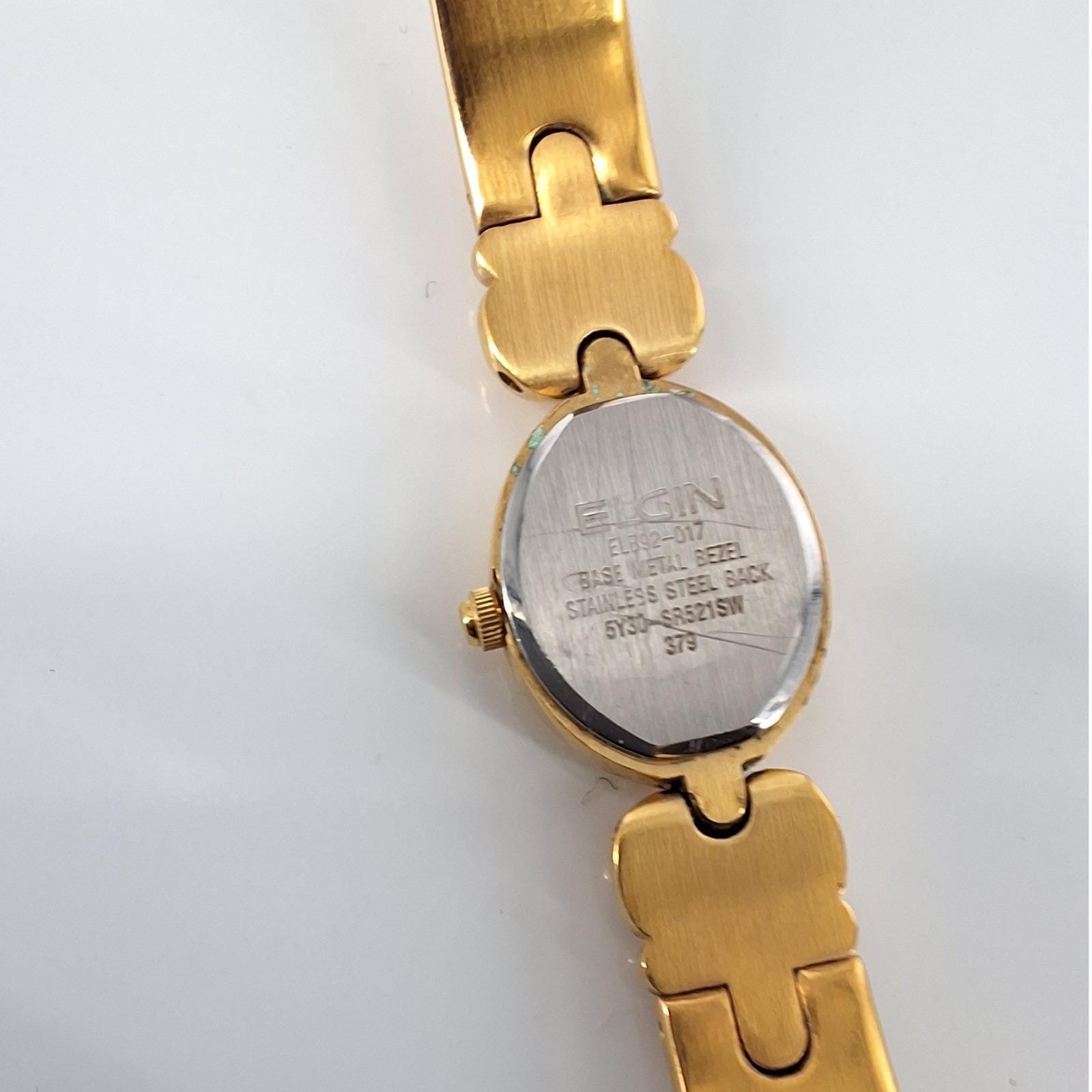 Vintage Elgin Gold Tone Oval Black Dial Diamond Accent Bangle Watch - View 3