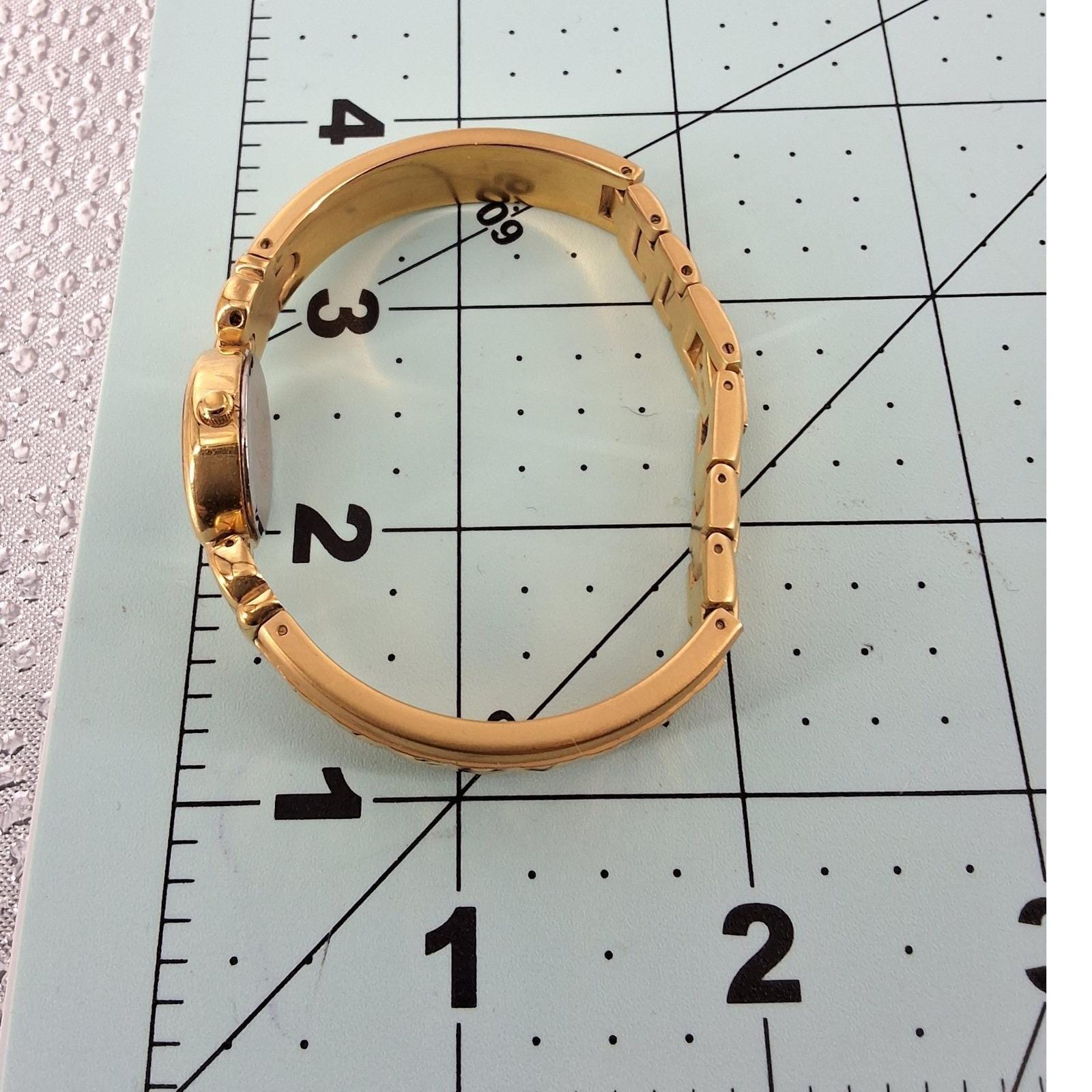 Vintage Elgin Gold Tone Oval Black Dial Diamond Accent Bangle Watch - View 7