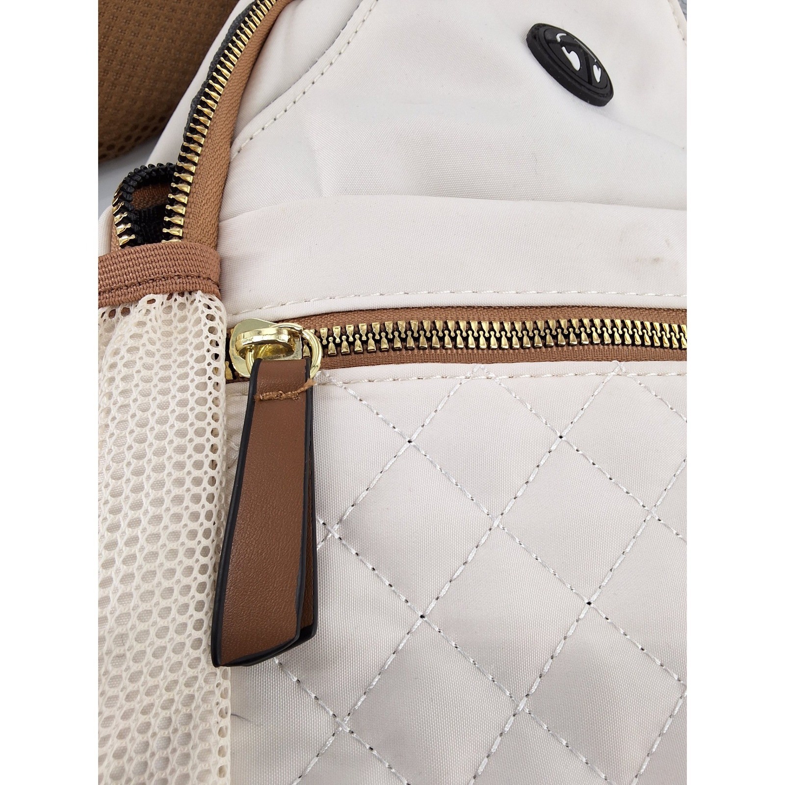 Cream Quilted Nylon Sling Bag Unisex Crossbody Backpack Headphone Port - View 4