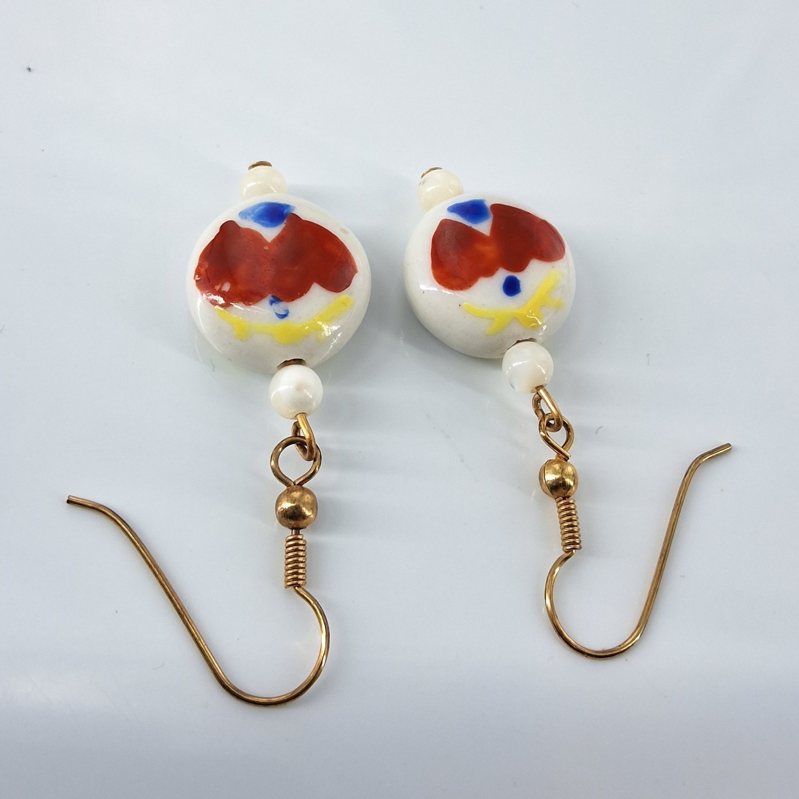 Hand Painted Ceramic Bead Drop Earrings White Red Blue Abstract Gold Tone - View 3