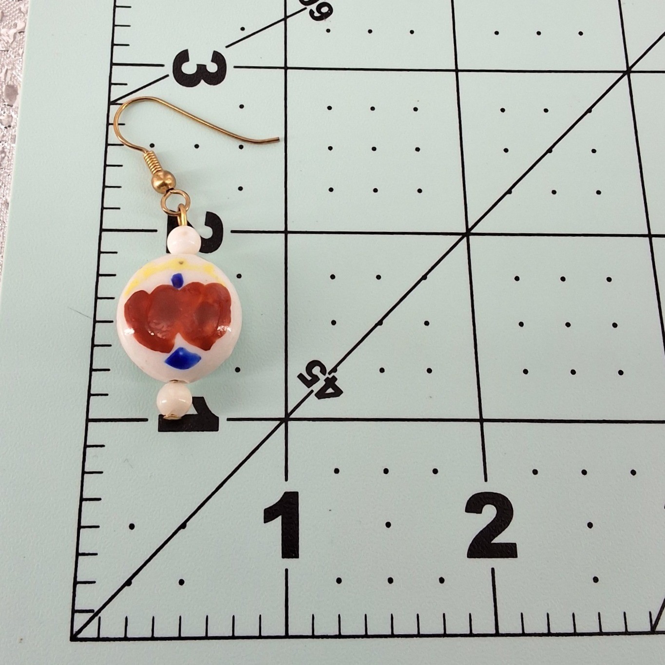 Hand Painted Ceramic Bead Drop Earrings White Red Blue Abstract Gold Tone - View 4