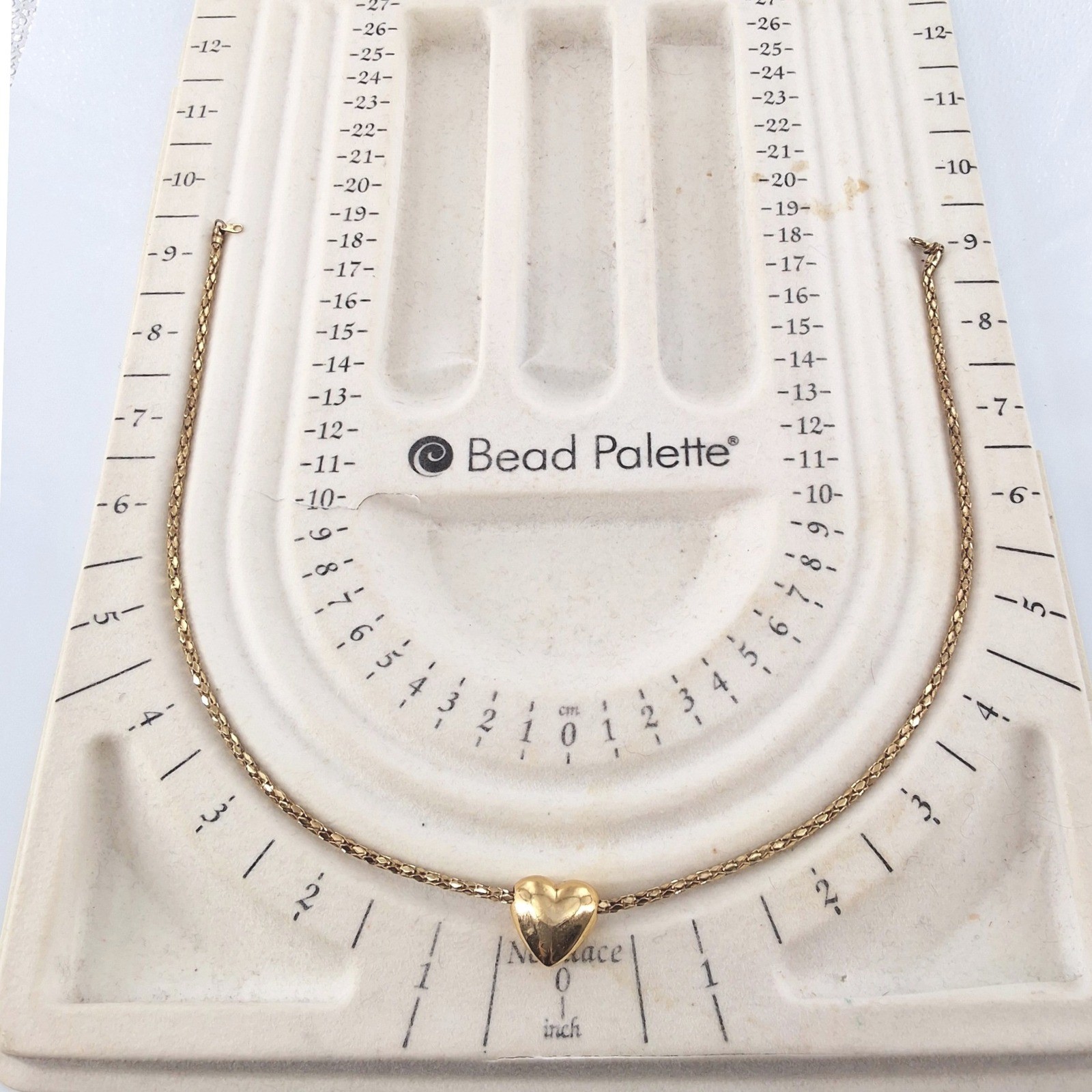 Sweet Romance Vintage Gold Tone Puffed Heart Pendant Necklace - View 3